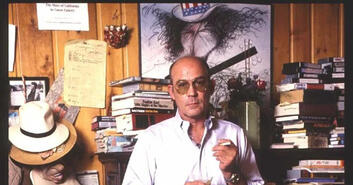 an image from fear & loathing in las vegas--features raoul duke preparing to exit a red convertible car in front of casino, illuminated from behind by an overwhelming number of small, yellow-ish lights.
